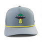 Logie Joe's Golf UFO Golf Hat in Alien Gray is a snapback cap featuring a colorful UFO beaming down a golf ball, with a yellow cord accent, built-in magnetic ball marker holder (marker included), and adjustable fit.