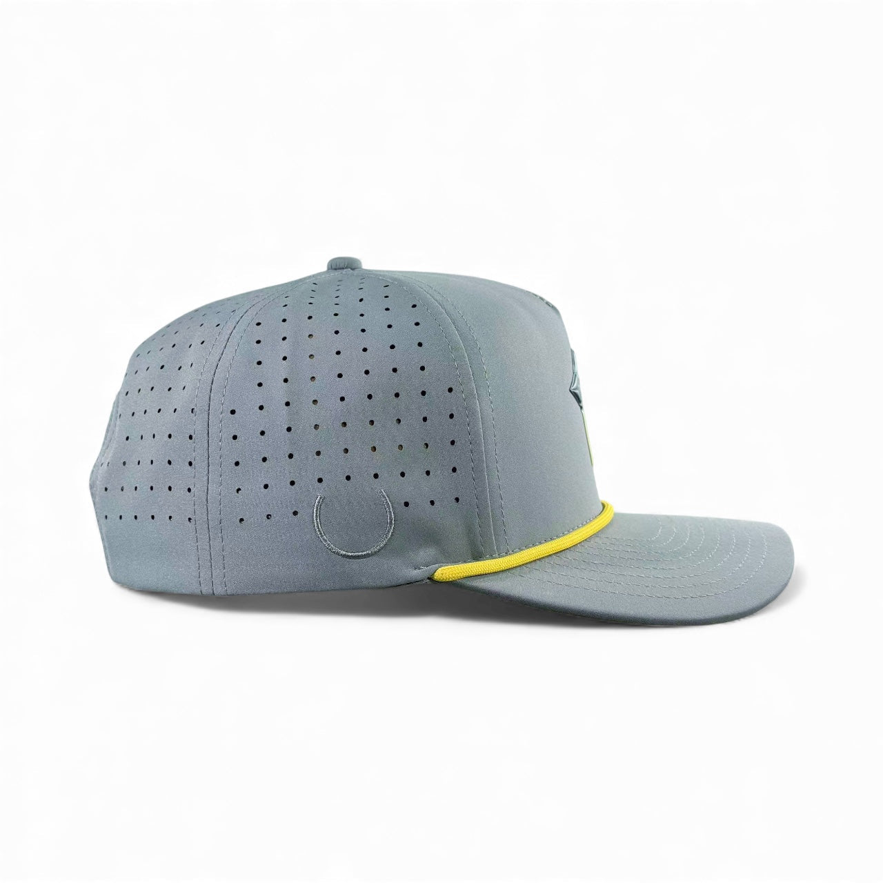 The Logie Joe's Golf UFO Snapback Cap in Alien Gray features perforated ventilation, a yellow brim stripe, a subtle circular side logo, an adjustable fit, and includes a built-in magnetic ball marker holder with marker. Displayed on white background.
