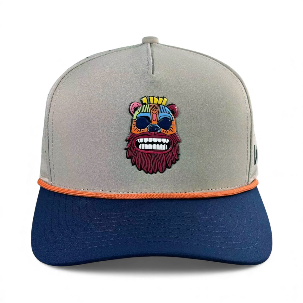 Logie Joe's Golf Tiki Bear Snapback Cap in gray and navy with orange trim features an embroidered tribal bear face, built-in magnetic ball marker holder, marker included, and is adjustable for a custom fit.