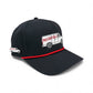 The Logie Joe’s Golf Free Golf Balls Van Snapback Hat features a black design with a red cord, a white van graphic labeled “Free Cole Balls,” and comes with a matching magnetic van pin ball marker on the left side.