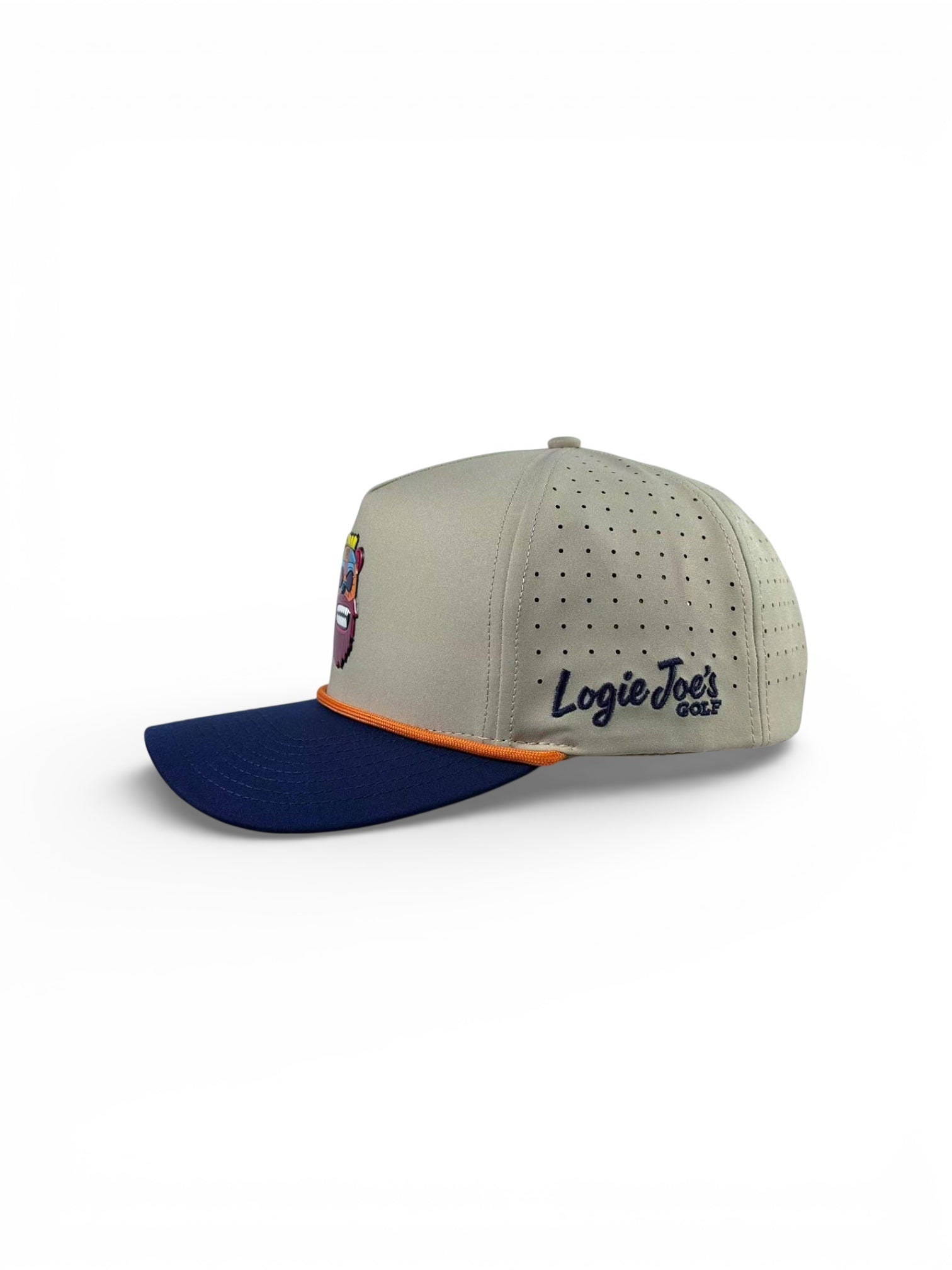 The Tiki Bear Golf Hat by Logie Joe's Golf is a beige and navy snapback cap with orange trim, front patch logo, side embroidery, built-in magnetic ball marker holder, and included marker. Shown on a white background.