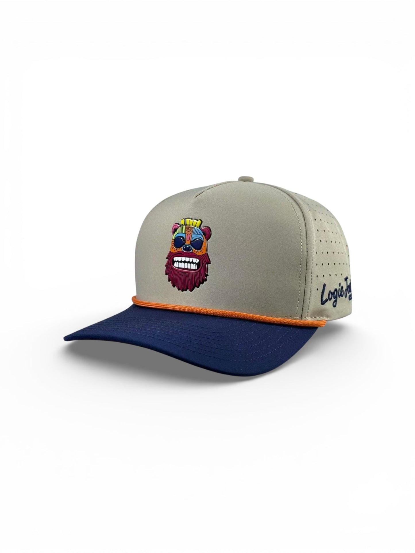 The Tiki Bear Golf Hat by Logie Joe's Golf is a gray and navy snapback with an embroidered colorful bear face, orange trim, perforated sides, Logie text on the left, and a built-in magnetic ball marker holder with marker included.