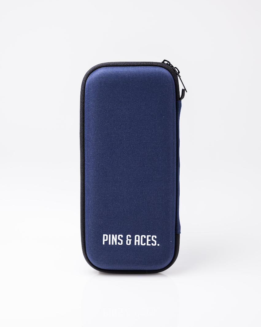 The Glove & Accessory Caddie - Navy by Pins and Aces stands upright with black trim on a white background, featuring the brand’s name in white on the front of this stylish golf accessory holder.