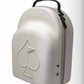 The Hat Caddie by Pins and Aces is a light gray hard-shell golf hat case featuring a raised spade symbol on the front, two side grommets, and a black top handle.