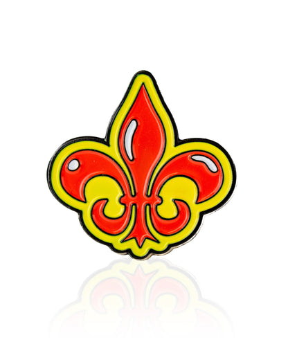 The Pins and Aces Fleur-de-lis Ball Marker features a glossy red and yellow design outlined in black, shown on a white background—a stylish premium golf accessory for your magnetic hat clip.