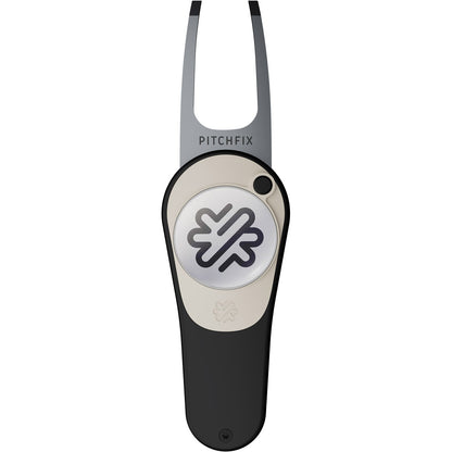 The PitchFix Icon Divot Tool by PitchFix is a sleek black and silver switchblade golf accessory with a forked metal end and a circular ball marker featuring a geometric logo and the PITCHFIX branding.