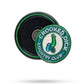 The Pop Out Medallion Ball Marker - Crooked Dick by Pins and Aces is a round green and white magnetic marker with "CROOKED DICK COUNTRY CLUB" text and a cartoon bent penis, shown next to its black case.