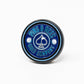 The Pop Out Medallion Ball Marker - Navy by Pins and Aces is a round blue magnetic marker featuring the brand’s name and an ace of spades in the center, flanked by two small golf balls.