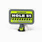 The HEYDUDE - Hole 51 Ball Marker by Pins and Aces is a green and black, warning sign-shaped cast metal ball marker featuring "WARNING HOLE 51 NO TRESPASSING" and a patch of grass at the base—perfect for ball marker collections.