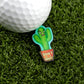 The Don’t be a Prick golf ball marker by Logie Joe's Golf features an angry cactus pin in a pot inscribed “DONT BE A PRICK!”—a premium, quirky accessory for standout golfers.
