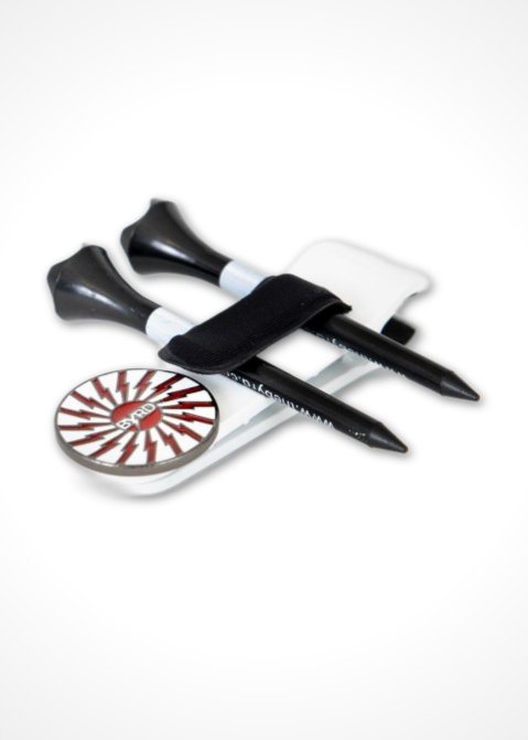 Two free tees are held together on The Byrd, LLC’s THE BYRD GOLF CLYP - White Swan ball marker holder with a black strap. A round marker with a red and white geometric pattern is placed next to the holder.