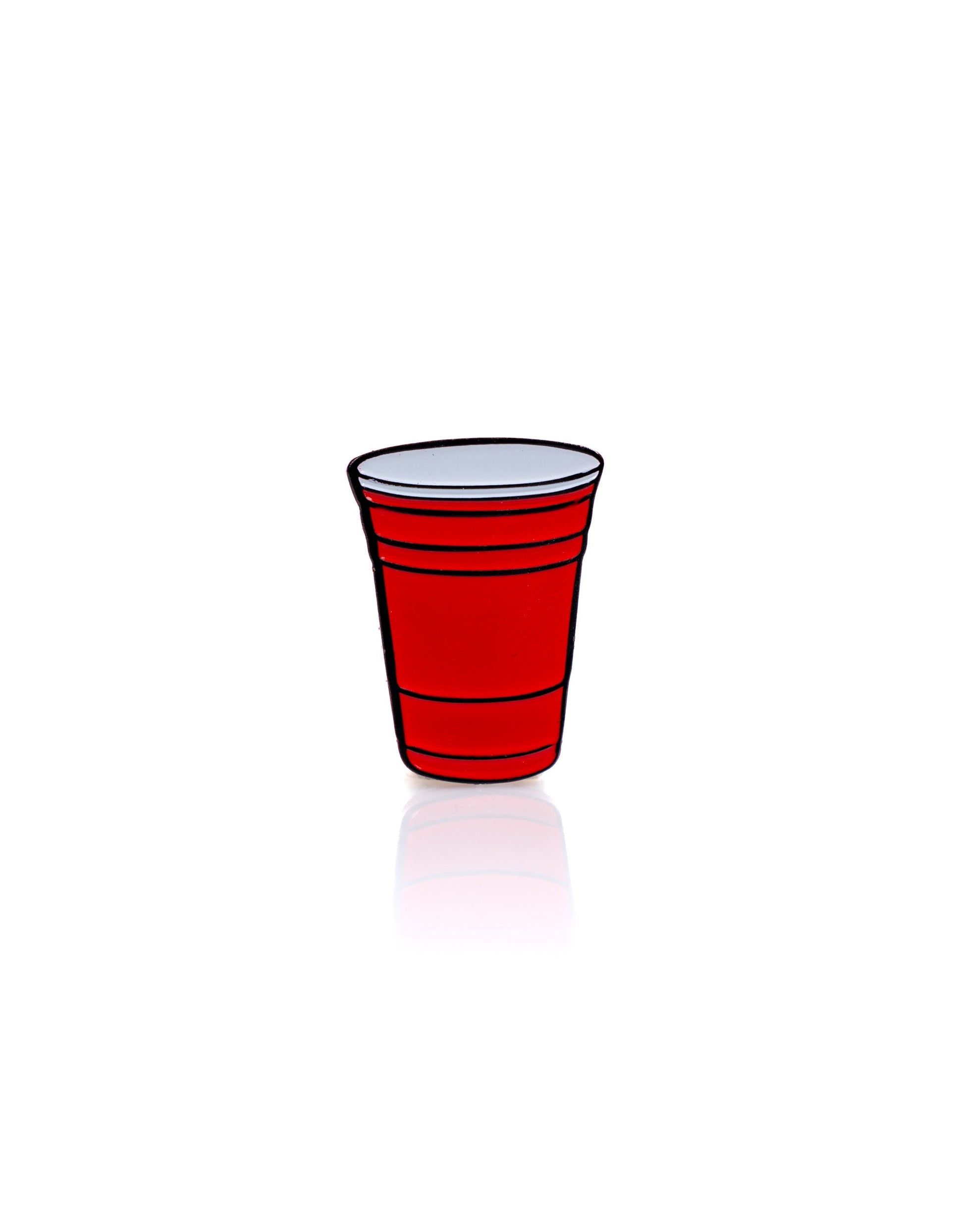 A simple illustration of the Red Party Cup Ball Marker by Pins and Aces—a red plastic cup with a white rim, centered on a white background with a faint reflection—perfect for showcasing this premium golf accessory.