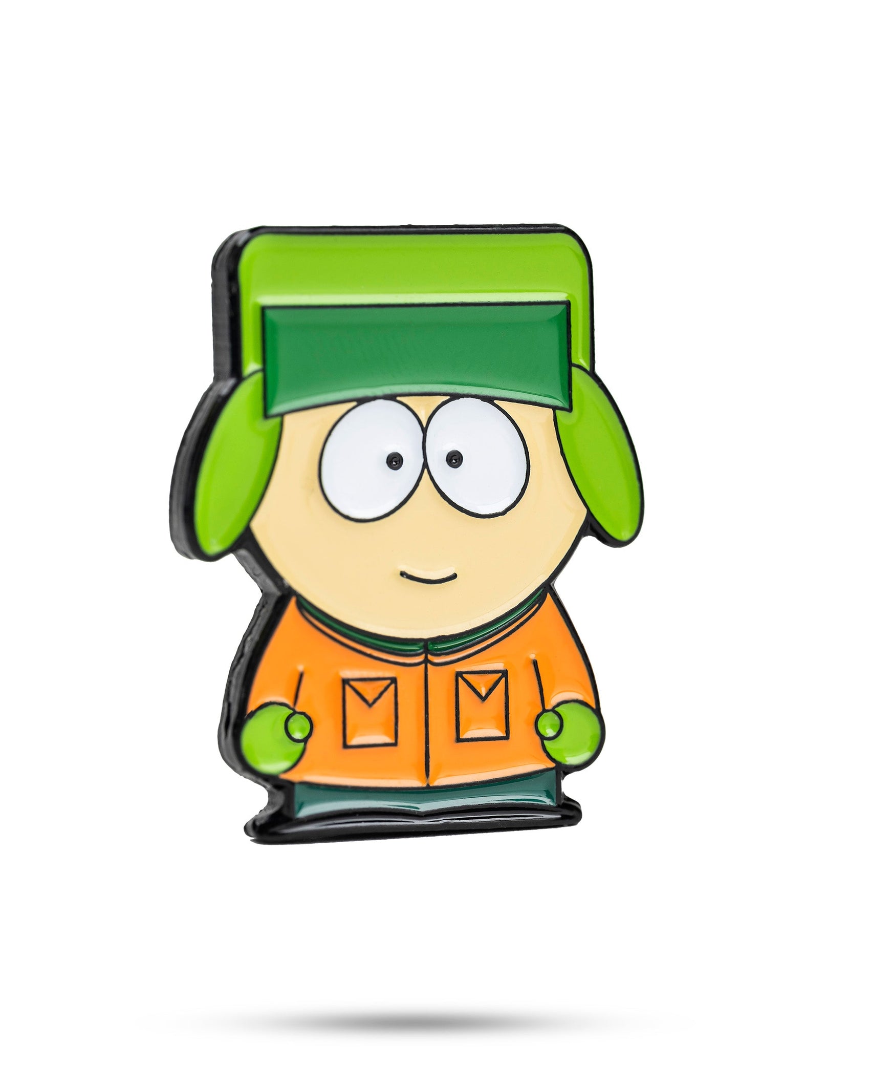 The South Park Ball Marker - Kyle by Pins and Aces features a cartoon character with a green hat, green gloves, orange jacket, and round eyes on a white background with a faint shadow. Part of the Pins and Aces South Park golf accessories collection.