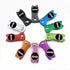A circular display of ten colorful, cat-shaped Ballmarkers.com Switchblade Divot Tools—each with a black "Ballmarkers.com" sticker at the center—adds playful style to your golf accessories, shown on a white background.