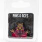 The TMNT - Splinter Ball Marker from Pins and Aces features a meditating brown rat in a red robe, inspired by Splinter. Packaged on a black card with branding in a clear case—perfect for TMNT fans and golf accessory collectors.