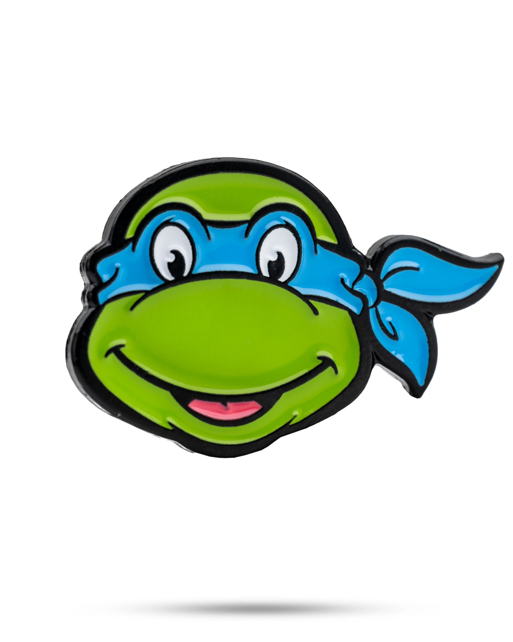 Show off your love for Teenage Mutant Ninja Turtles with the TMNT - Leonardo Ball Marker by Pins and Aces, featuring a smiling turtle head with green skin and a blue mask—the perfect golf accessory for any TMNT fan.