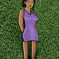 The Thai Lady Boy pin from Ballmarkers.com features an illustrated woman with short black hair in a purple dress, set against a grassy background—ideal as a premium golf ball marker or Lady Boy divot tool accessory.