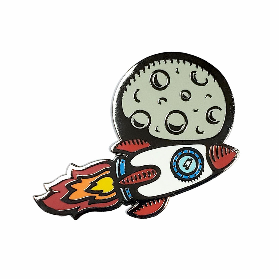 The Kolorspun Rocket Ship Golf Ball Marker features a cartoon rocket with red flames in front of a gray moon—ideal for a custom golf gift or to add a unique touch to your game.