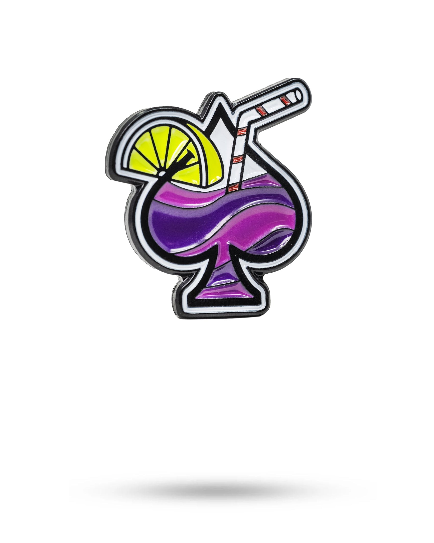 A vibrant illustration of a purple cocktail in a curvy glass with lemon and striped straw, set on white background with the Pins and Aces Transfusion Spade Ball Marker logo, from brand Pins and Aces.