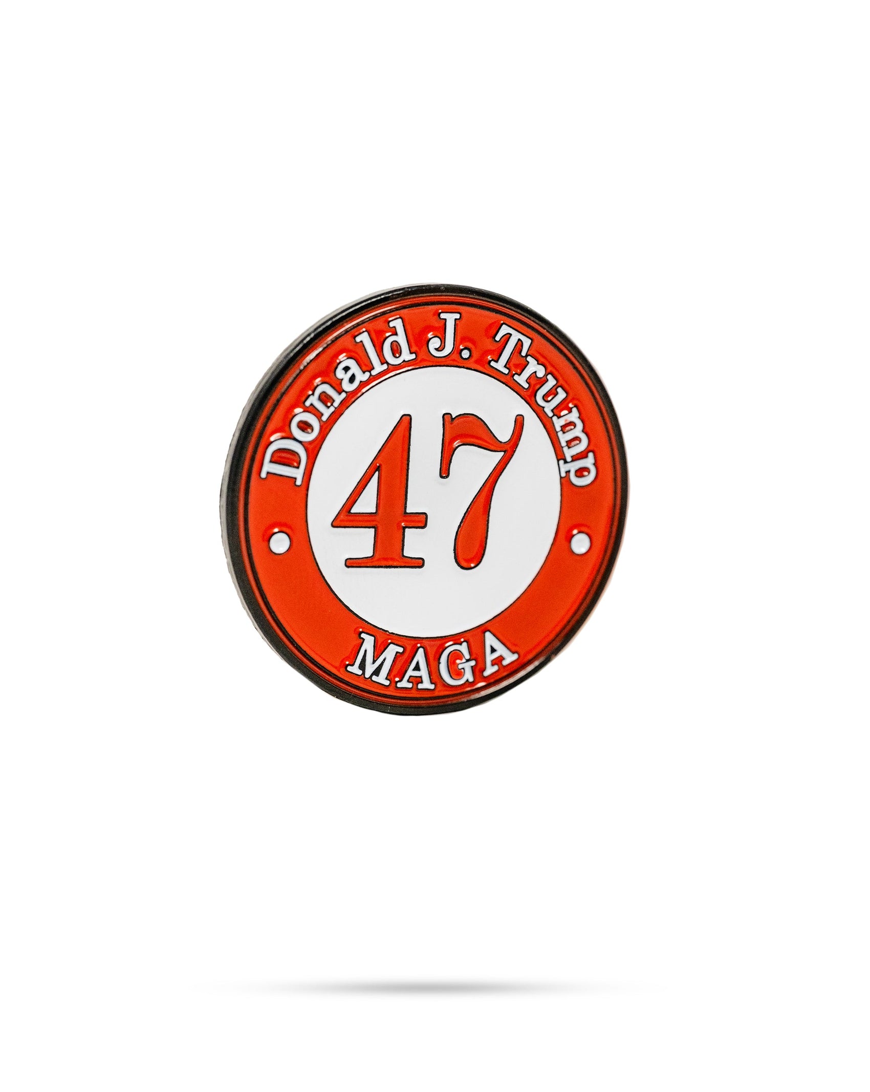The Pins and Aces 47 Ball Marker features a round design with a red border, "Donald J. Trump" at the top, bold "47" in the center, and "MAGA" at the bottom on a white background—a perfect limited edition golf accessory.