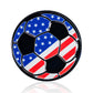 The USA Soccer Ball - Ball Marker by Pins and Aces features black pentagons and U.S. flag-inspired hexagons in a premium enamel finish. Shown on a white background with a subtle reflection below.