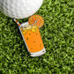 The Vodka Screwdriver Ball Marker by Ballmarkers.com features a glass of screwdriver cocktail design—complete with ice cubes, orange slice, and striped straw—perfect for marking your ball or adding flair to your collection.