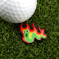 The Worm Burner by Logie Joe's Golf is a vibrant golf ball marker shaped like a green worm with big eyes and fiery red-yellow flames—an ideal pick for anyone who loves unique golf accessories.