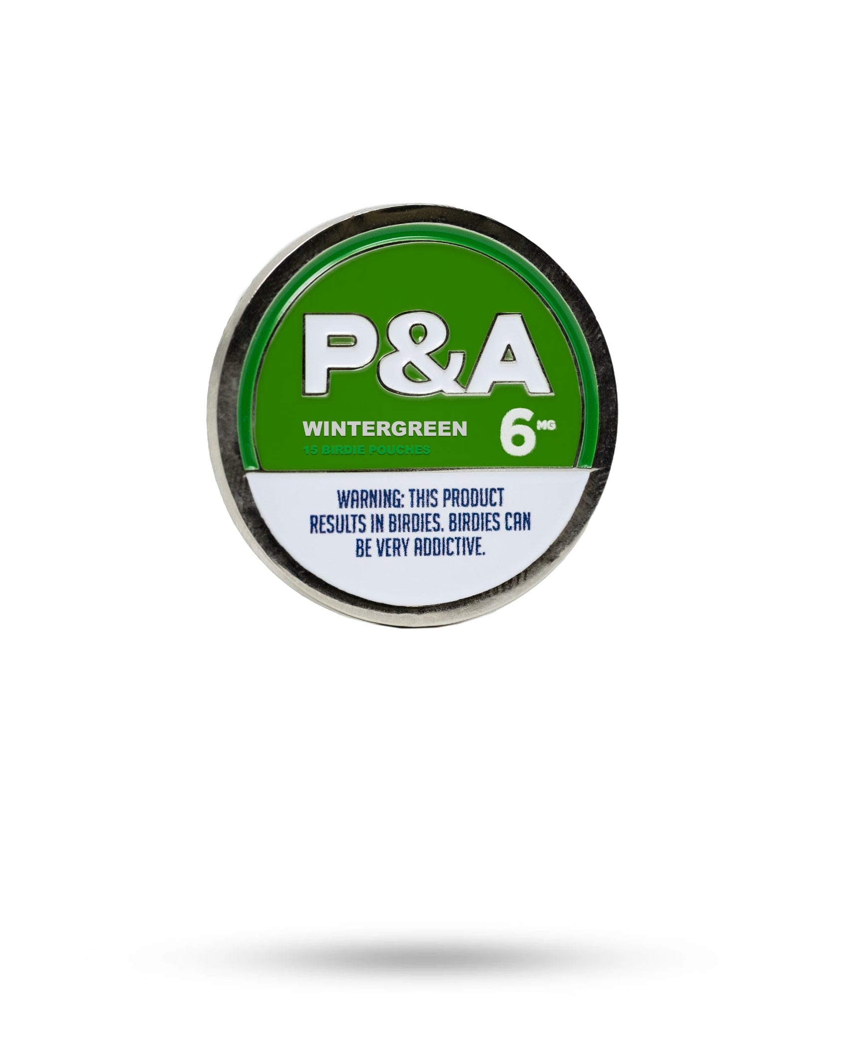 A round tin labeled Pins and Aces 6 Milly - Wintergreen Ball Marker with a warning, "This product results in birdies. Birdies can be very addictive," sits beside an enamel golf marker on a white background with a soft shadow.