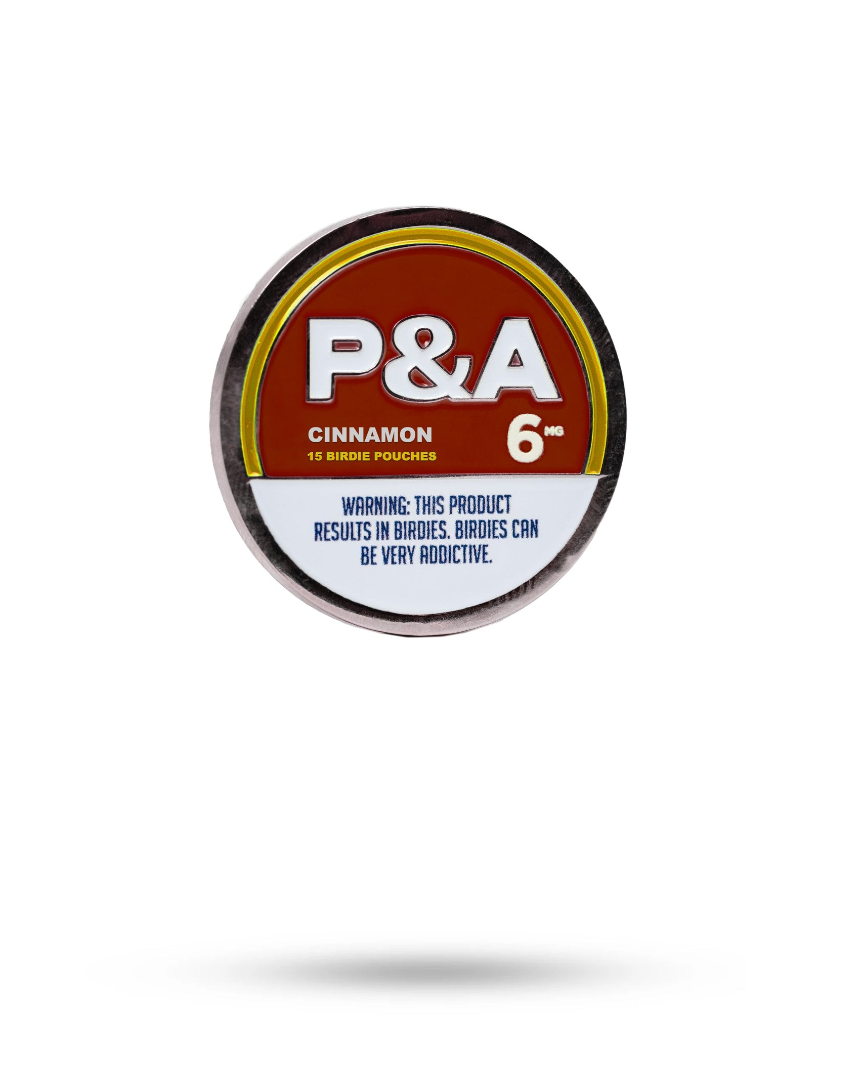 A round container labeled Pins and Aces 6 Milly - Cinnamon Ball Marker appears on a white background. Warning: This product results in birdies. Includes magnetic ball marker for the perfect golf accessory combo.
