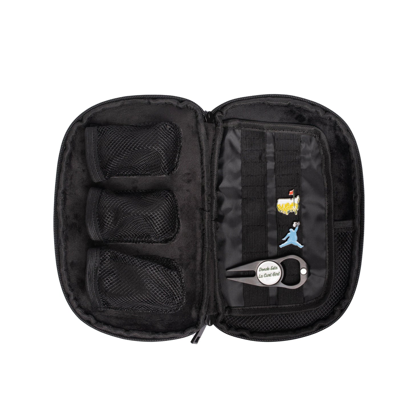 The Grunk Dolfer Grunk Accessory Bag is an open black zippered case with three mesh pockets for golf accessories, assorted pins, and a keychain labeled "Double like a cool chef" attached to the right-side straps.