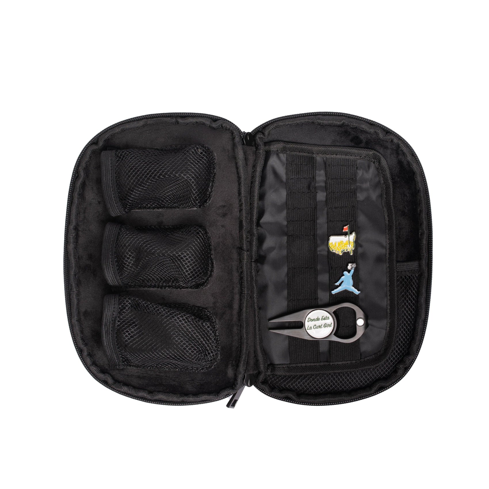 The Grunk Dolfer Grunk Accessory Bag is an open black zippered case with three mesh pockets for golf accessories, assorted pins, and a keychain labeled "Double like a cool chef" attached to the right-side straps.