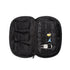 The Grunk Dolfer Grunk Accessory Bag is an open black zippered case with three mesh pockets for golf accessories, assorted pins, and a keychain labeled "Double like a cool chef" attached to the right-side straps.