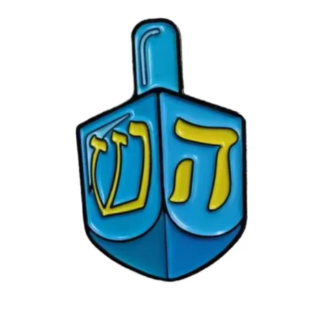 The Hanukkah Dreidel Ball Marker from Golf Gear Heaven features a blue design with yellow Hebrew letters, making it a unique golf ball marker for Tee Bumps fans.