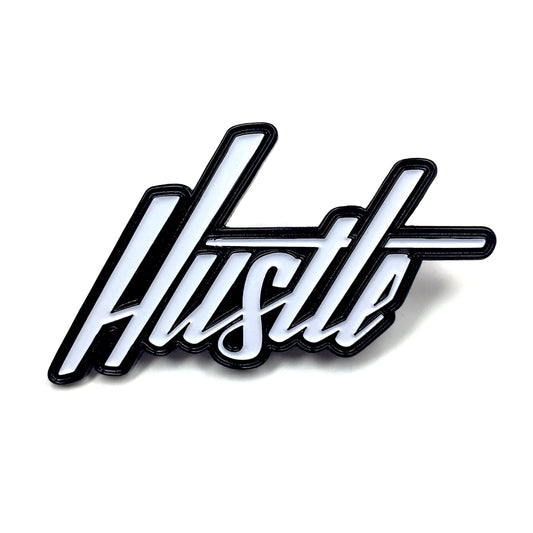 The Kolorspun Hustle Golf Ball Marker features "Hustle" in bold, white cursive with a black outline—an ideal personalized gift or unique golf ball marker for dedicated players.