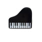 The Kolorspun Piano Golf Ball Marker is a small, black magnetic marker shaped like a grand piano with detailed keys—a unique custom golf gift—shown on a plain white background.