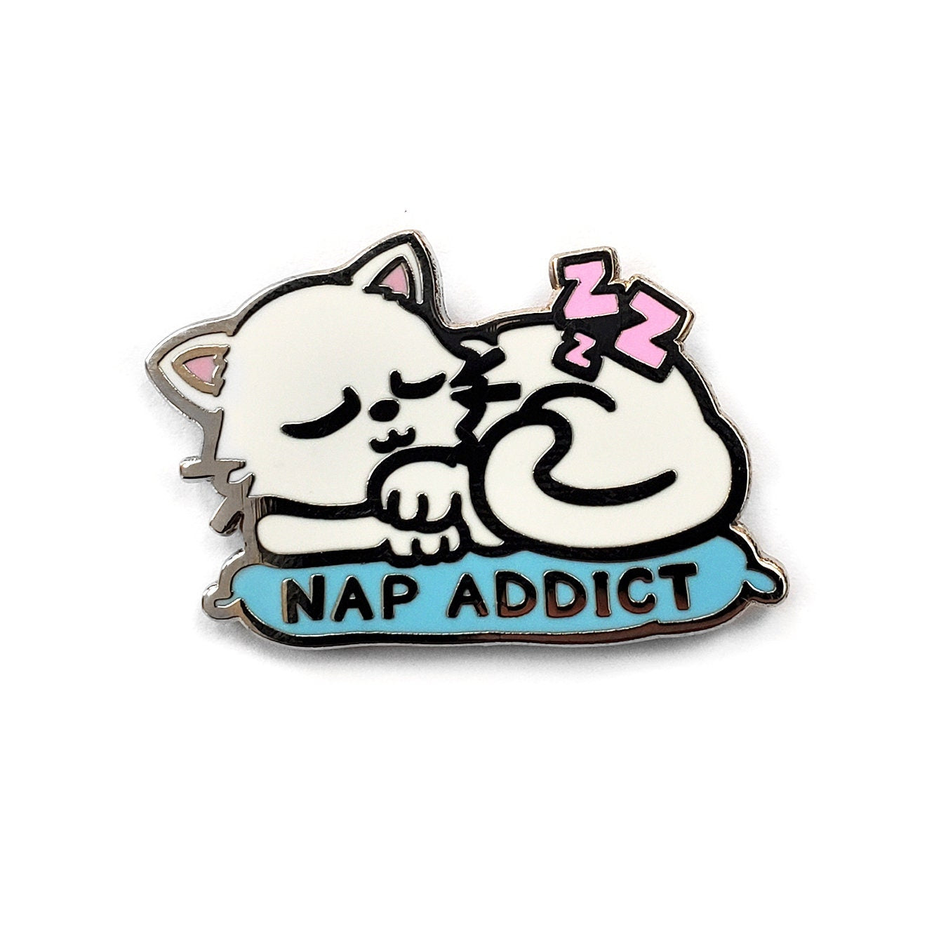 The Cat Nap Addict Golf Ball Marker by Kolorspun features a cute cartoon cat sleeping on a blue mat labeled "NAP ADDICT" with pink Zs—perfect as a custom golf gift or unique magnetic ball marker for cat lovers.