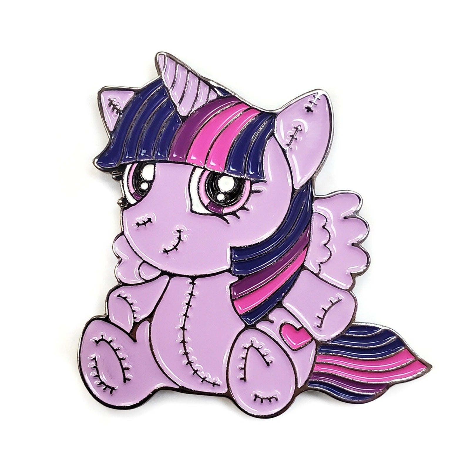 Kolorspun’s Unicorn Golf Ball Marker features a cute cartoon-style purple unicorn with big eyes, a blue and pink mane, wings, and stitched details—an adorable gift or custom golf accessory for unicorn lovers.