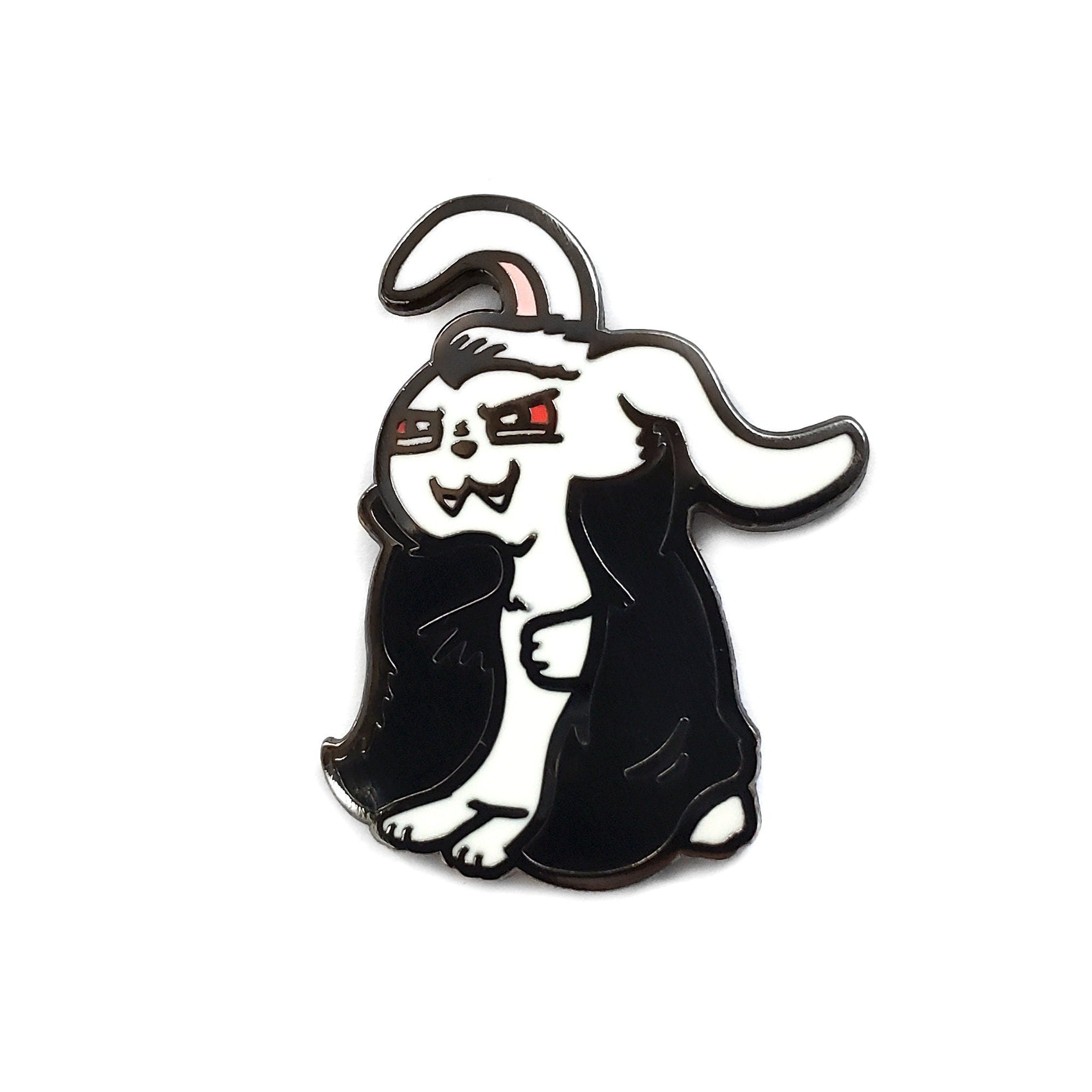 The Kolorspun Vampire Bunny Golf Ball Marker features a cartoon bunny with red eyes, fangs, and a black cape on a white background—a fun, unique choice for any golfer or as a quirky golf gift.