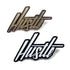 The Kolorspun Hustle Golf Ball Marker set includes two shiny enamel pins—one gold and black, one black and white—with bold, cursive "Hustle" designs. Perfect as a unique golf gift or creative magnetic marker for the green.