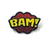 Kolorspun’s Bam Golf Ball Marker features bold yellow "BAM!" lettering with a black outline on a red cloud background with dotted accents—a comic-style, magnetic marker and fun custom gift for golfers.