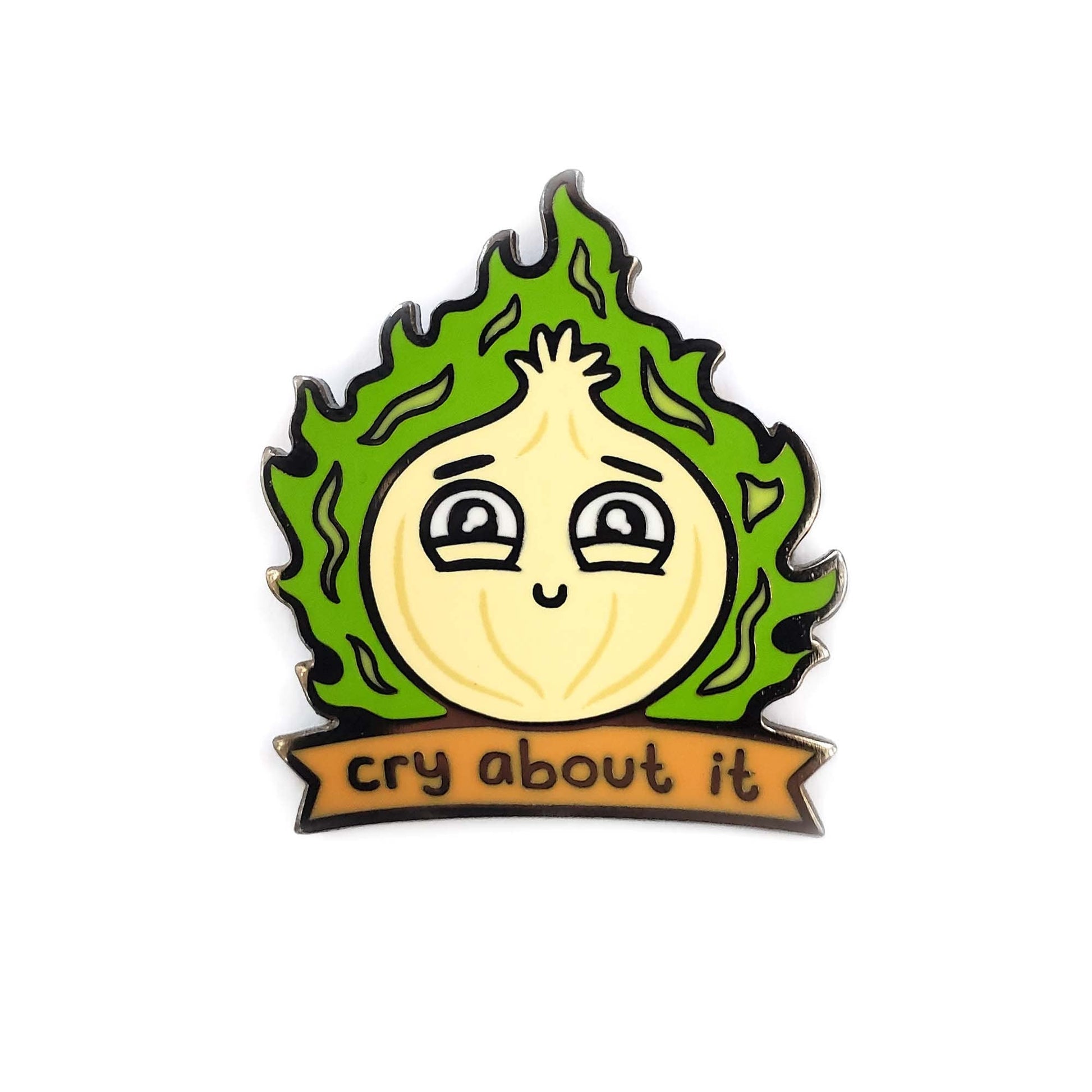 The Kolorspun Cry About It Onion Golf Ball Marker features a sad cartoon onion with green flames above a brown banner—making it a fun, unique golf gift.