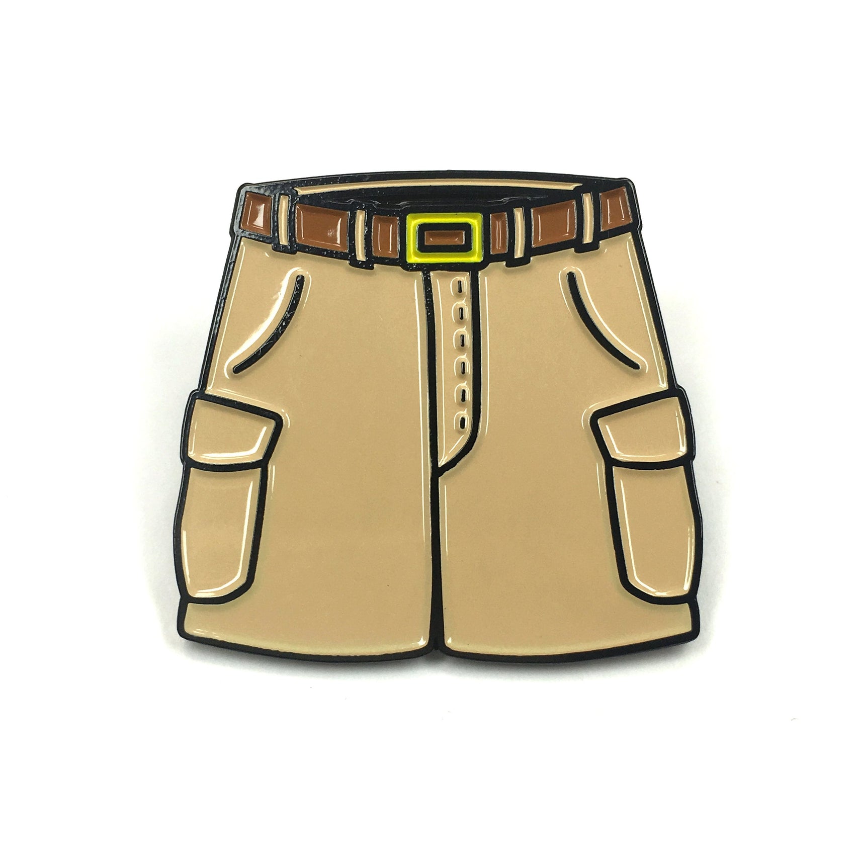The Kolorspun Cargo Dad Shorts Golf Ball Marker features a pin shaped like beige cargo shorts with side pockets, brown belt loops, a yellow belt buckle, and stitched details—a unique golf gift displayed on a white background.