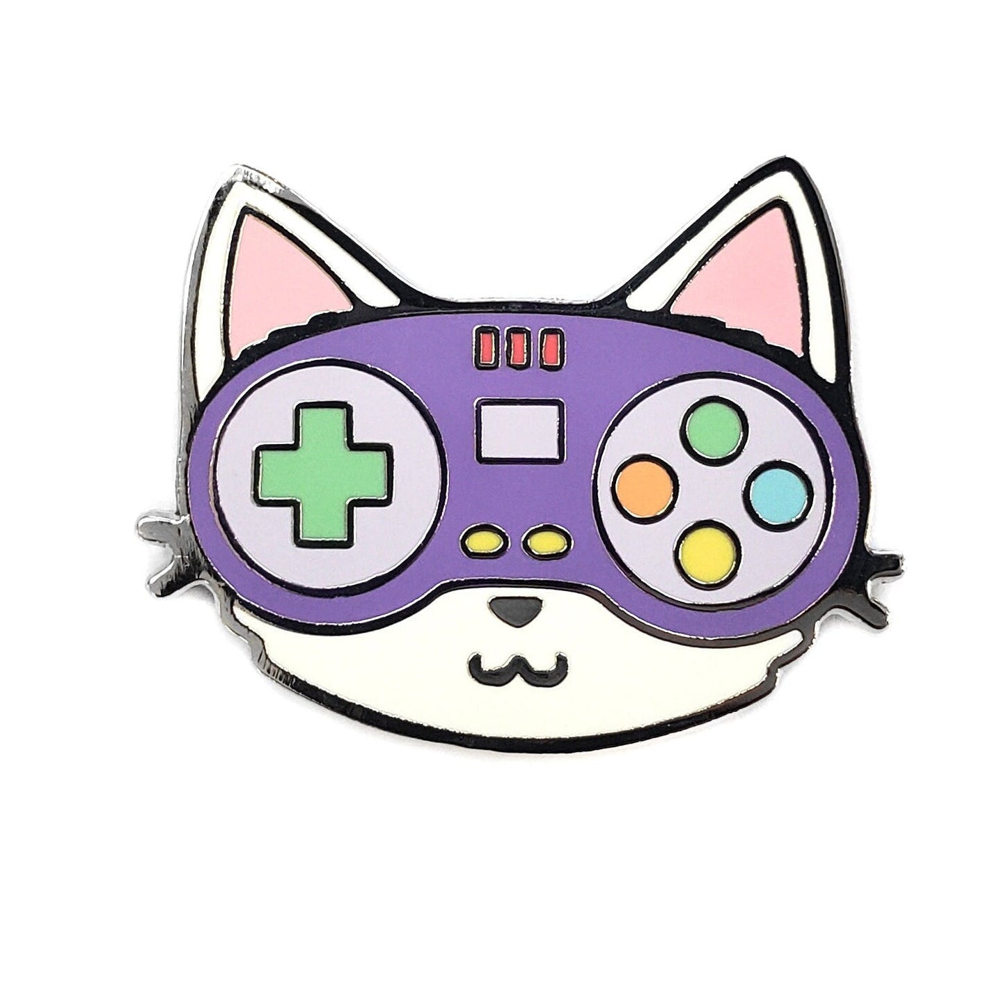 Kolorspun’s Controller Cat Golf Ball Marker features a cartoon cat face with a purple video game controller for eyes and nose, adorned with colorful buttons and a green cross-shaped button, set on a white background.