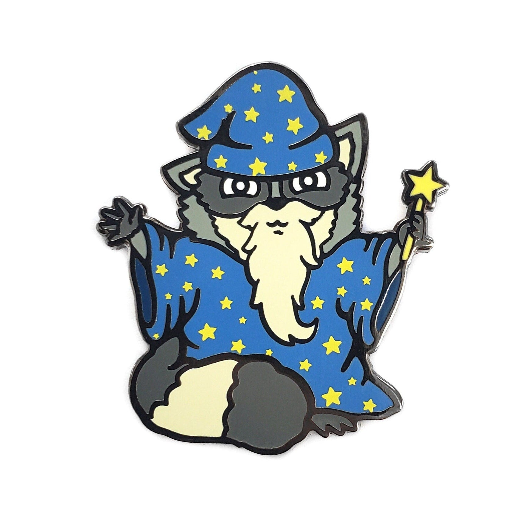 The Kolorspun Wizard Raccoon Golf Ball Marker features a cartoon raccoon wizard in a blue robe and starry hat, holding a star-tipped wand, glasses, and a white beard—perfect for unique golf gifts or custom markers.