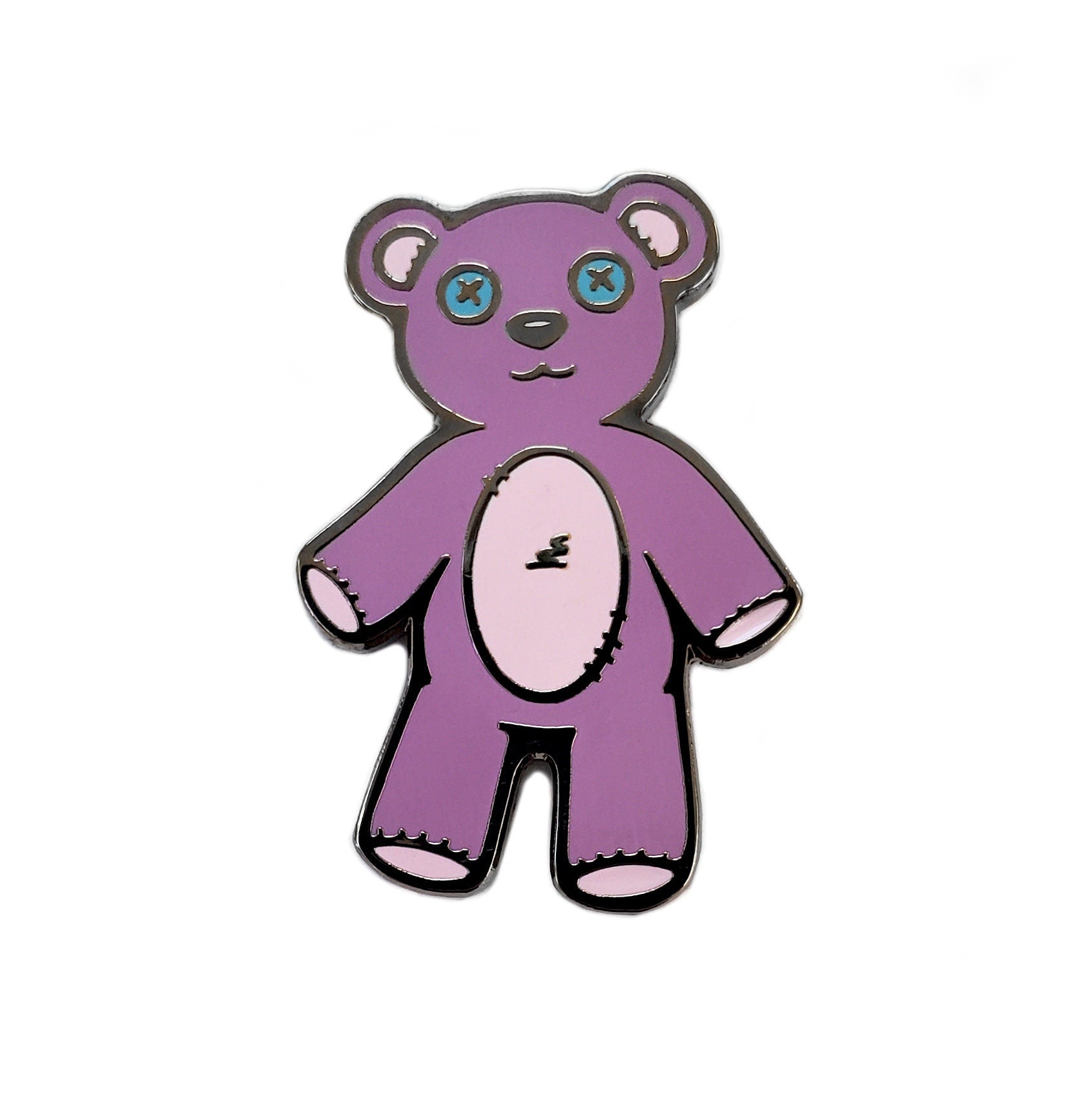 The Kolorspun Teddy Bear Golf Ball Marker features a cartoon-style purple teddy bear with blue button eyes and a white belly, outlined in black, shown against a plain white background.