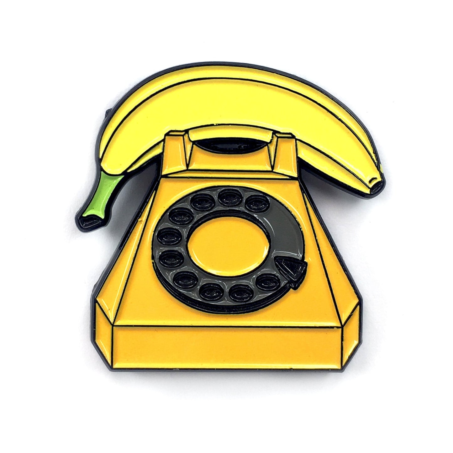 A quirky, cartoon-style image for Kolorspun's Banana Phone Golf Ball Marker, featuring a bright yellow banana atop a rotary phone—fun and unique, perfect as a novelty golf gift.