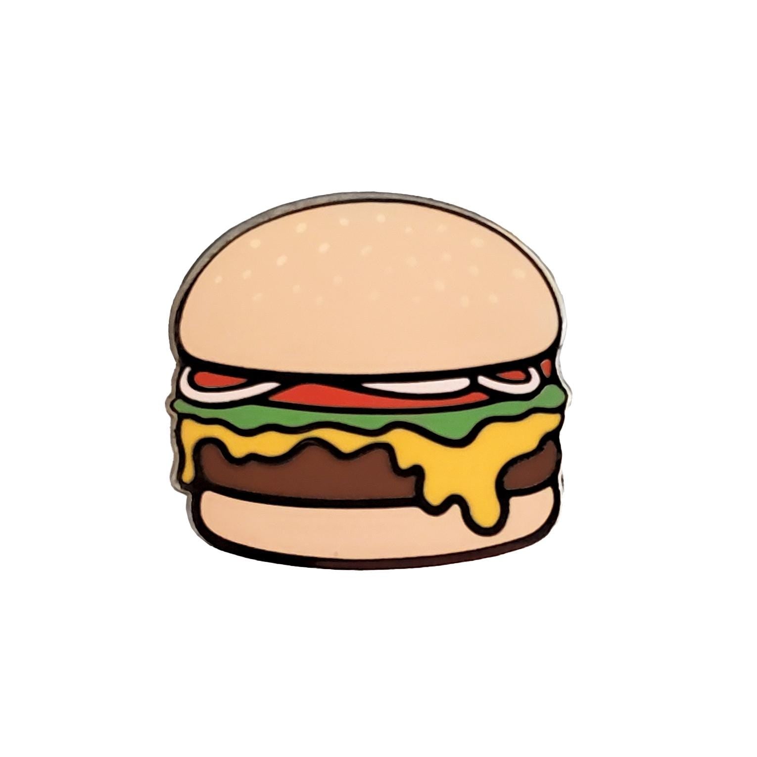 Kolorspun's Cheeseburger Golf Ball Marker features a sesame seed bun, lettuce, tomato, and melting cheese over a beef patty on a white background—ideal as a golf gift or for customizing your gear.