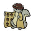 A cartoon squirrel in a brown hat and yellow coat clutches the Kolorspun Shady Squirrel Golf Ball Marker and a map with acorn symbols, glancing suspiciously to the side.