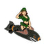 The Bombshell Girl Ball Marker by Ballmarkers.com features a cartoon woman in a green uniform saluting on a flying shark-face bomb, inspired by classic nose art and vintage golf accessory style.