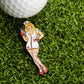 The Punk Rock Nurse Ball Marker by Ballmarkers.com features a cartoon nurse in a short white outfit and red heels holding a syringe—perfect for fun nurse golf accessories.